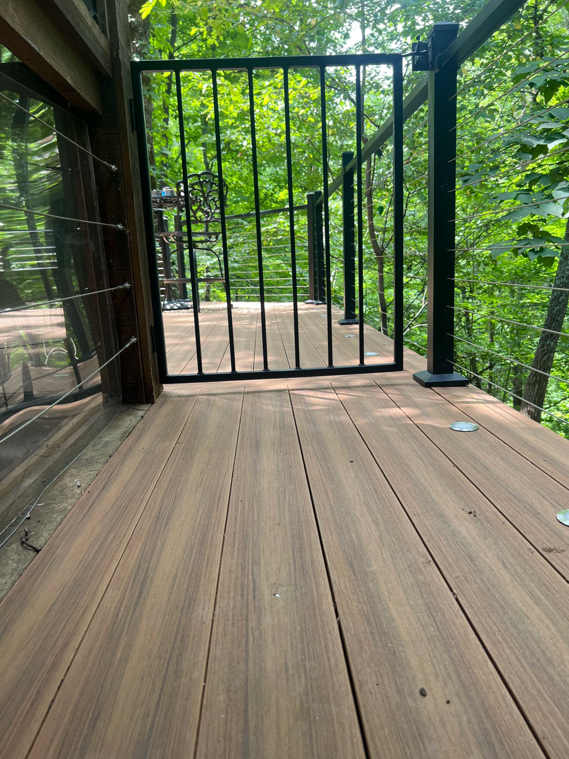 Custom Cable Rail Deck Built Into the Tree Line in Lake Lure