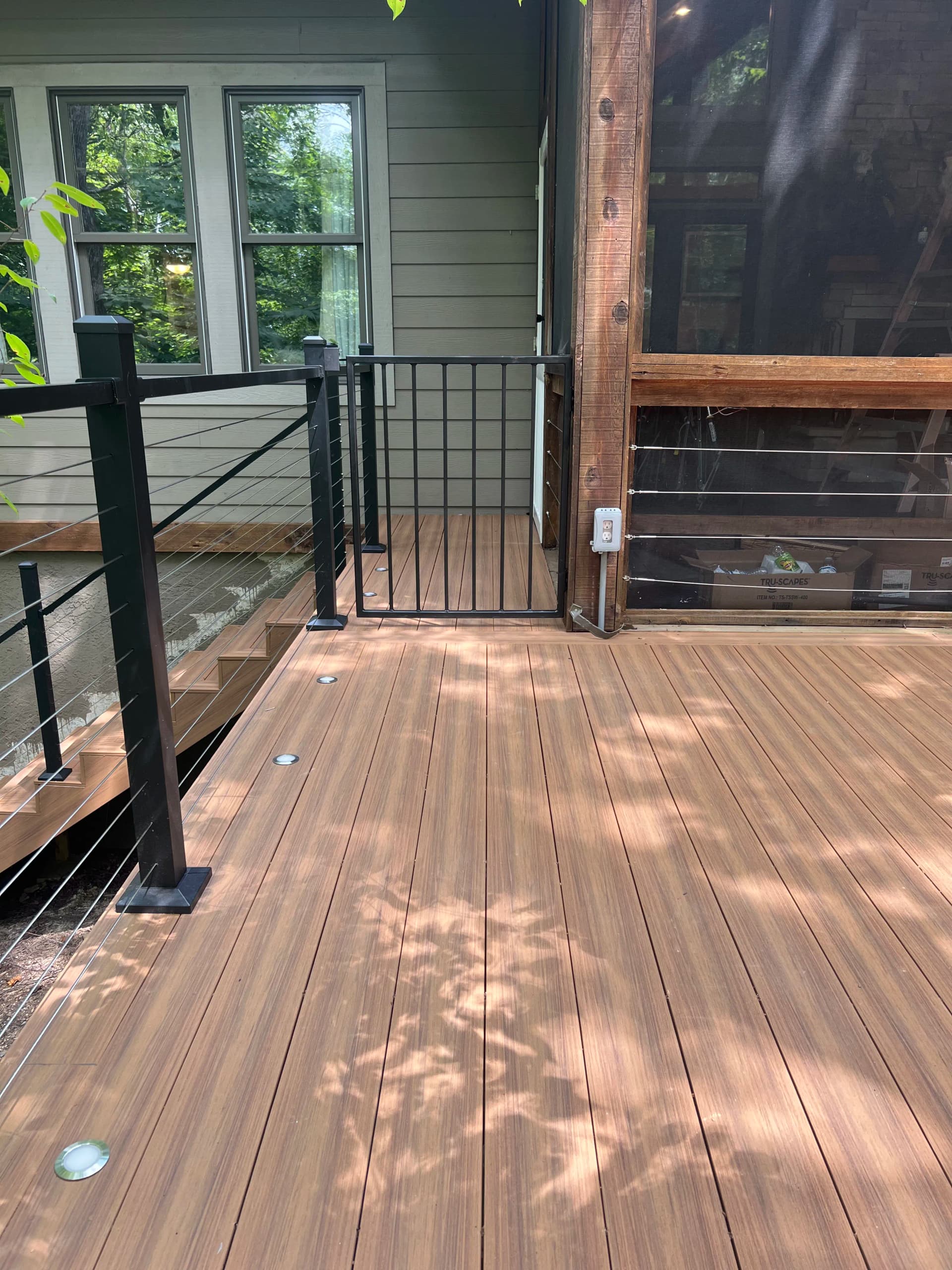 Custom Cable Rail Deck Built Into the Tree Line in Lake Lure