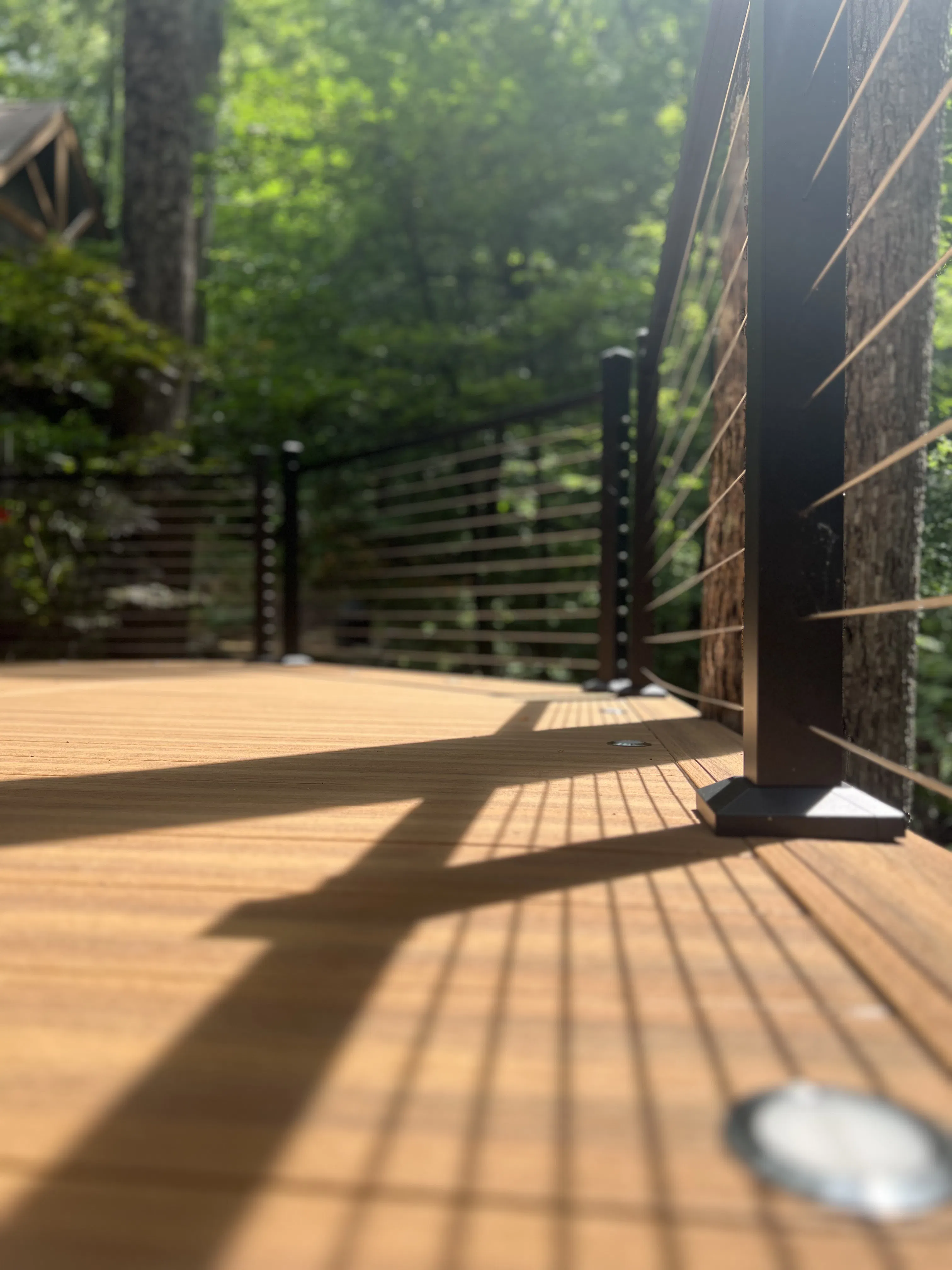 Project Custom Cable Rail Deck Built Into the Tree Line in Lake Lure image